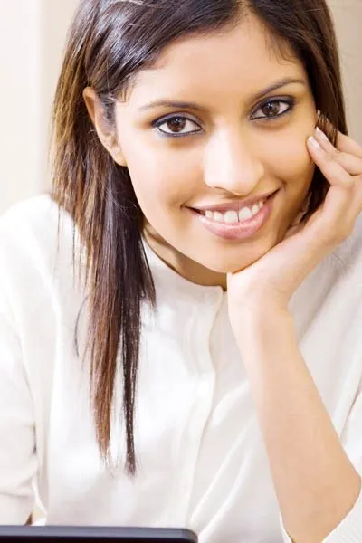 woman smiling receiving dental care at Southview Dental Care