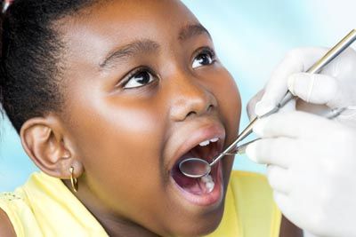 young girl getting a dental checkup at Southview Dental Care