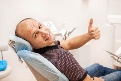 man relived of tooth pain after his root canal procedure at Southview Dental Care